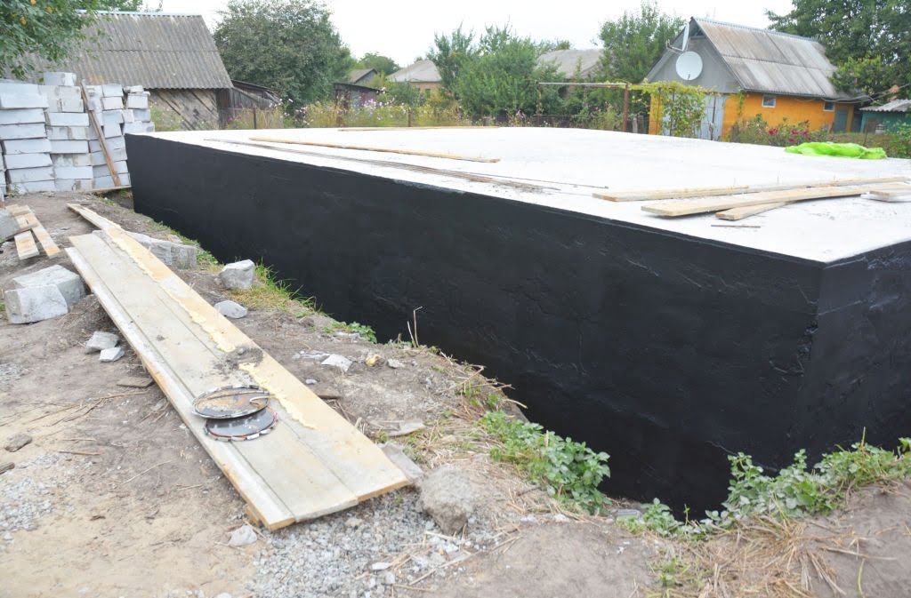 cement and concrete contractor performing basement waterproofing