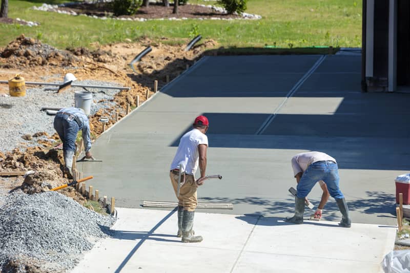 workers performing concrete flatwork