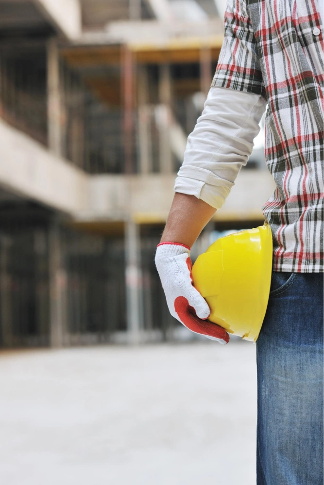 cement and concrete contractor analysing cement wall