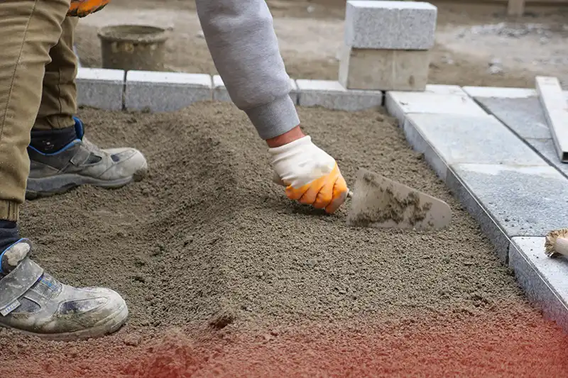 What Makes Concrete Curbs Superior to Wood and Plastic Borders?
